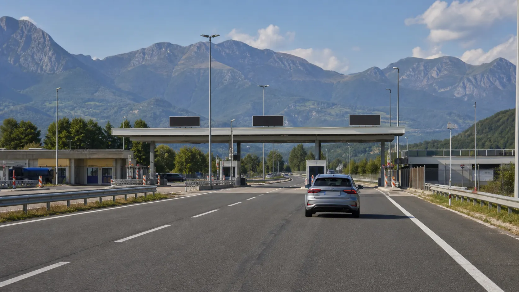 Car approaching a European border crossing where one country's vignette ends and the next begins
